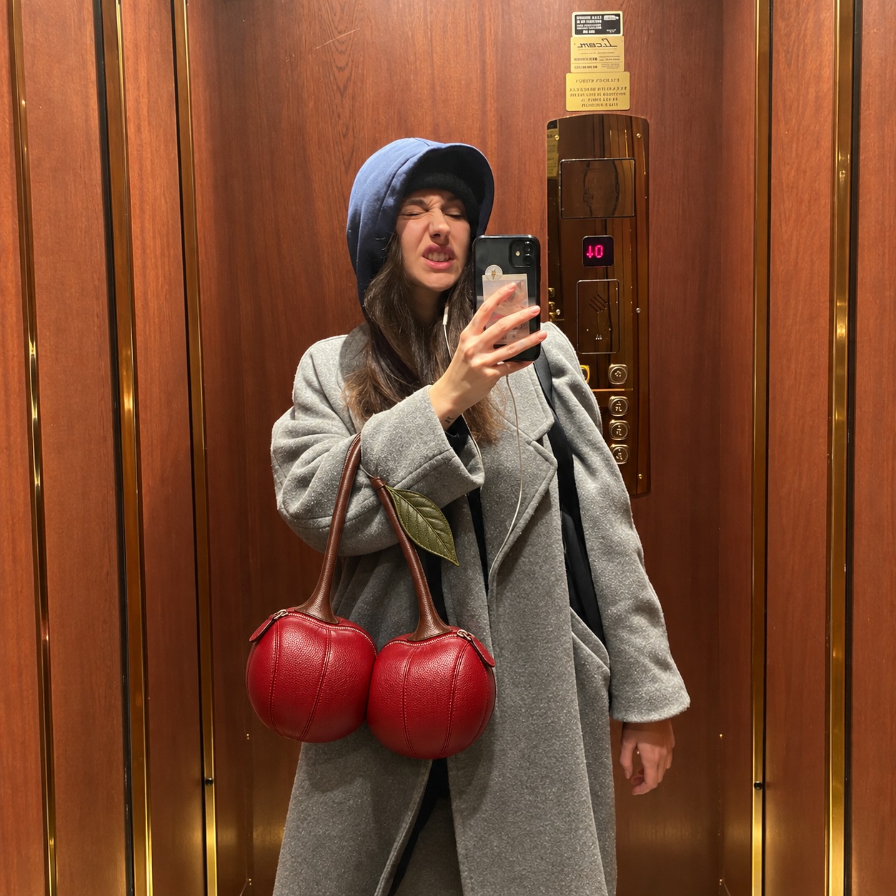 Cherry Crush in an elevator mirror outfit photograph